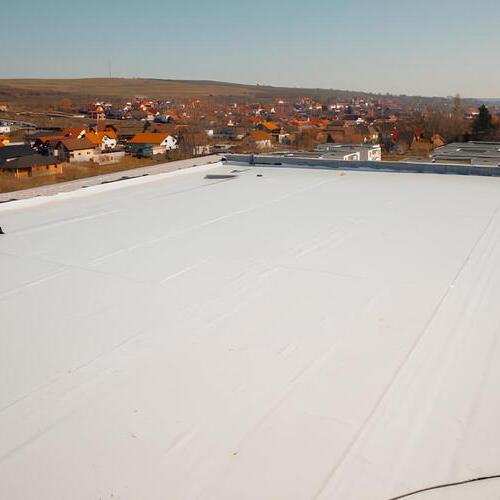 view from above of a white silicone roof coating